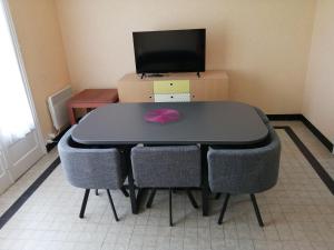Maisons de vacances La Petite Isle - Maison et jardin - plage a 200 m : photos des chambres