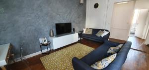 Appartements L'Ecu : un Haussmannien accueillant! : photos des chambres