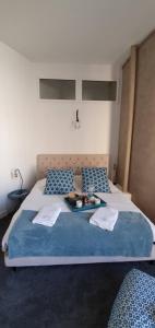 Appartements L'Ecu : un Haussmannien accueillant! : photos des chambres