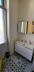 Appartements L'Ecu : un Haussmannien accueillant! : photos des chambres