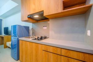 Simply Look Studio Tamansari Mahogany Karawang Apartment By Travelio