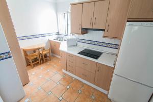 Two-Bedroom Apartment with Sea View room in Hostal Marissal