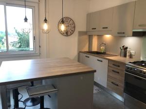 Appartements L'Appartement d'Helene : photos des chambres