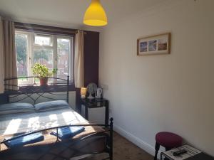 Double Room with Shared Bathroom room in Hour Glass Hotel