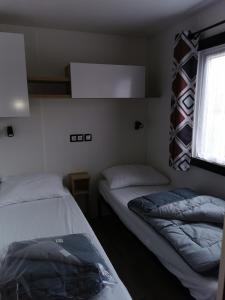 Campings Assist' Mobil Home h01 - Mobil home recent 3 chambres 8 personnes : photos des chambres