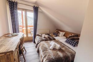 Chalet La Perle de L'Oisans - Appartements d'Exception : photos des chambres