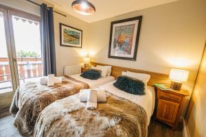 Chalet La Perle de L'Oisans - Appartements d'Exception : photos des chambres