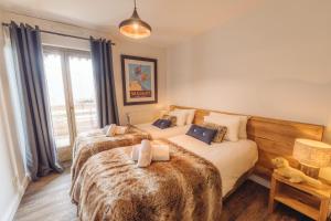 Chalet La Perle de L'Oisans - Appartements d'Exception : photos des chambres