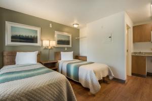 Studio Room with Two Twin Beds Non-Smoking room in HomeTowne Studios by Red Roof Dallas - Mesquite
