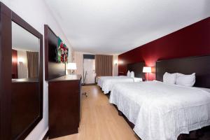 Deluxe Room with Two Queen Beds Smoke Free room in Red Roof Inn PLUS+ Huntsville – Madison