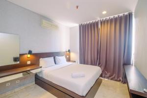 Great Choice and Spacious 3BR at The Empyreal Epicentrum Kuningan Apartment By Travelio