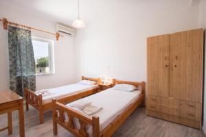 Two-Bedroom Apartment with Pool View room in Elena Rooms & Apartments