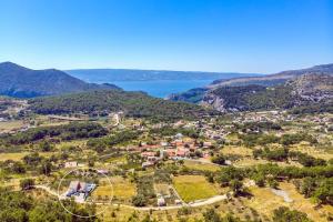 Villa Flora with a 53 sqm private pool with Cinema room with projector and 4 en-suite bedrooms