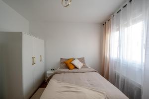 Appartements Le Petit Drancy - T2 tout equipe : photos des chambres