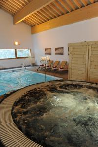 Appartements Le Hameau SPA & PISCINE studio 4pers by Alpvision Residences : photos des chambres