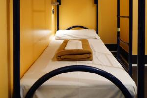 Bed in 6-Bed Female Dormitory Room with Private Bathroom room in Hi! Ostello Milano