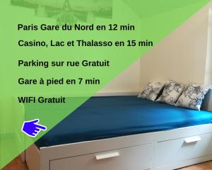 Appartements Paris Gare du Nord en 14 min - Studio Le Palmier - : photos des chambres