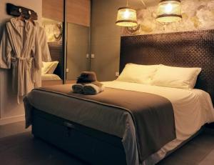 Maisons de vacances Suite l'inattendu avec Spa privatif et espace bien-etre. : photos des chambres