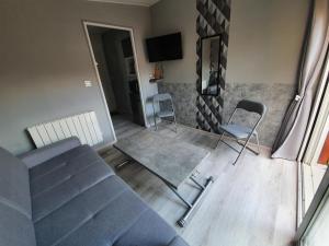 Appartements Les Plumes : photos des chambres