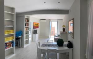 Rosso Tramonto luxury-white- LADISPOLI, Lungomare Regina Elena 58