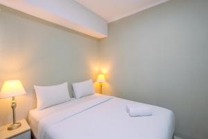 Comfortable and Spacious 2BR at Oasis Cikarang Apartment By Travelio
