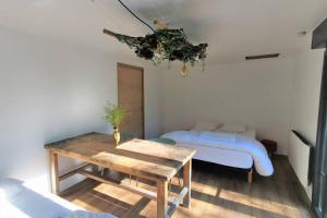 Maisons de vacances l'Annexe moderne - Jacuzzi - Bois & Riviere : photos des chambres