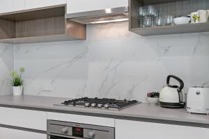 KOZYGURU WAITARA KOZY 2 BED APT WALK TO TRAIN STATION NWA008