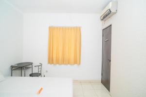 Losmen Family Syariah Bypass Juanda Mitra RedDoorz