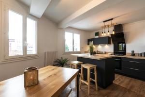 Appartements DORMIR A CLERMONT-FERRAND - Safari : photos des chambres