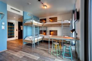 Bed in 6-Bed Mixed Dormitory Room room in MEININGER Hotel Berlin Tiergarten