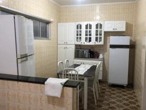 Casa Guilhermina com Piscina e Churrasqueira