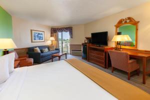 King Room with Balcony and Bay View room in Apple Tree Inn; SureStay Collection by Best Western