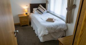 Deluxe Triple Room room in The Windmill Inn