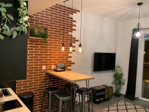 Appartements Relaxhome - Hypercentre - Clim - Netflix : photos des chambres