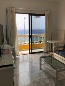 VV 122 con Balcón, en primera línea de mar