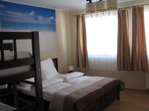 Krzywy Domek w Ostrowie Morza Brzeg