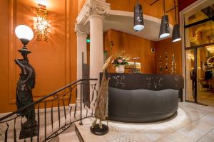 Hotels Le Grand Hotel : photos des chambres