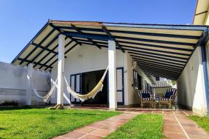 Tranquilidade a alguns passos da praia - churrasqueira, super wi-fi!