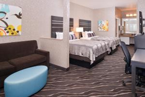 Queen Room with Two Queen Beds with Sofa Bed room in Best Western Plus Park Place Inn - Mini Suites