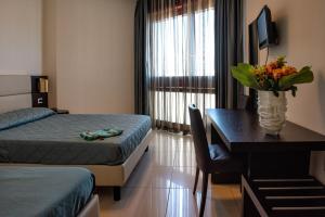 Dreibettzimmer mit Meerblick