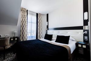 Hotels Jehan De Beauce - Les Collectionneurs : photos des chambres