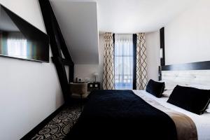 Hotels Jehan De Beauce - Les Collectionneurs : photos des chambres