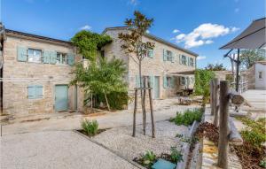 Amazing apartment in Zminj with Outdoor swimming pool and 1 Bedrooms