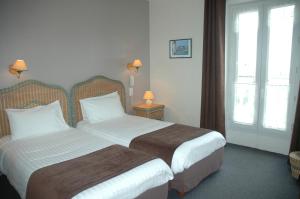Hotels Hotel L'Ecailler : photos des chambres