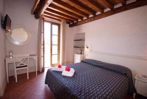 Quadruple Room with Terrace room in Hotel Corallo