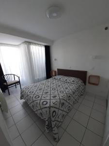 Appartements Rez de jardin 5 pers avec piscine, vue directe sur la plage a 40 m : photos des chambres
