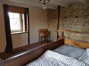 Maisons de vacances Spacieuse ferme renovee fin 18ieme s. classee 3* : photos des chambres