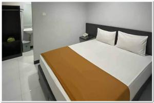 Losmen Family Syariah Bypass Juanda Mitra RedDoorz