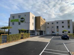 Hotels B&B HOTEL Ouistreham : photos des chambres