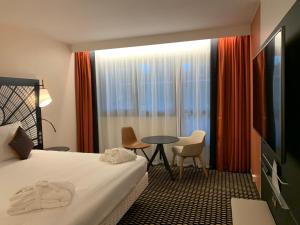 Hotels Mercure Paris Porte De Versailles Expo : photos des chambres